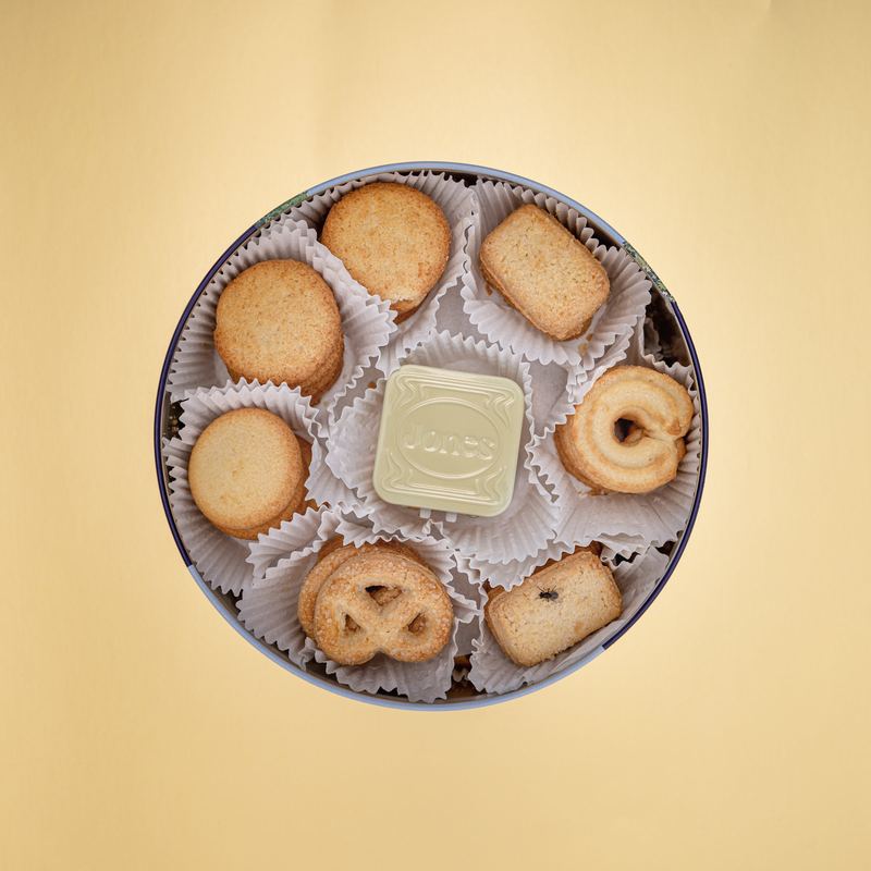 Tin nested in a butter cookie box, Byline Jones Editorial by David Spector