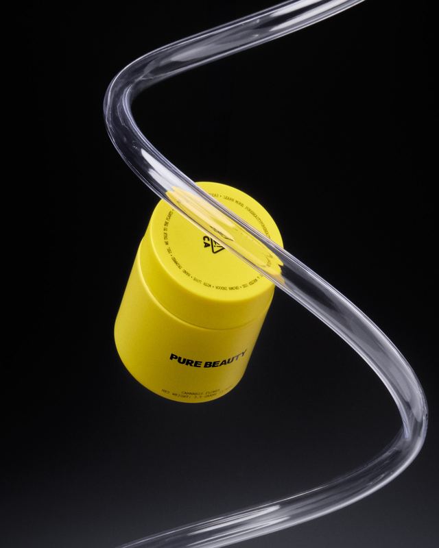 Yellow jar threaded on clear tubing, Pure Beauty by David Spector