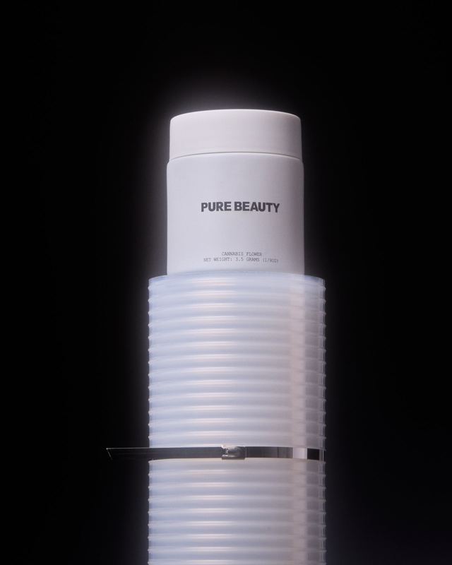 White jar on a stack of ridged cups, Pure Beauty by David Spector